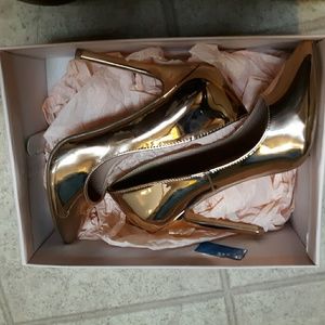 Rose gold pumps